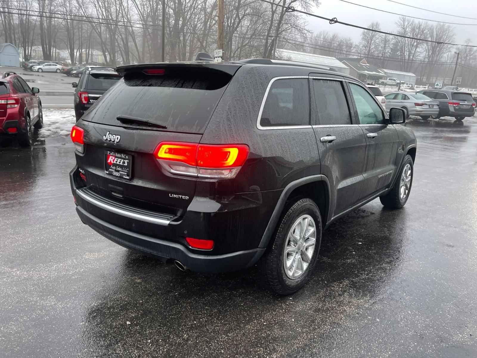 2015 Black /Black Jeep Grand Cherokee Limited 4WD (1C4RJFBG2FC) with an 3.6L V6 DOHC 24V FFV engine, 8-Speed Automatic transmission, located at 11115 Chardon Rd. , Chardon, OH, 44024, (440) 214-9705, 41.580246, -81.241943 - Photo #8